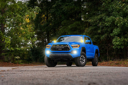 Morimoto 4Banger Ditch Light Kit: 16-23 Tacoma (HXB Yellow SAE Wide Beam)